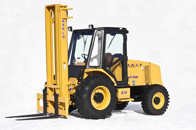 The HP8500 rough-terrain forklift with optional cab is one of three models manufactured by Harlo Products.