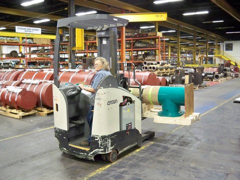 An RM 6000 narrow-aisle reach truck in action