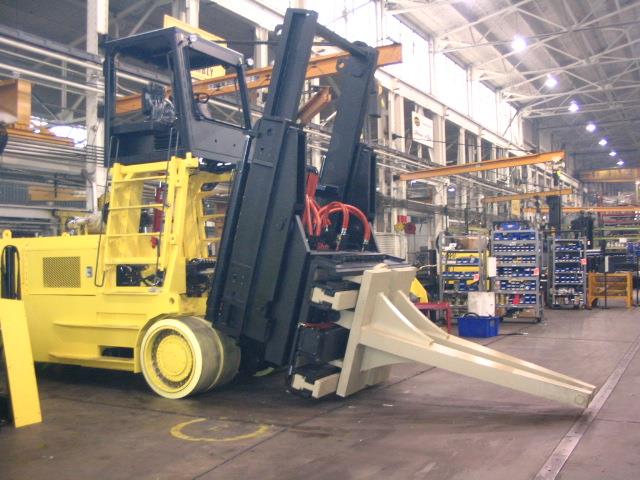 Long Reach's forge clamp for removing hot metal billets