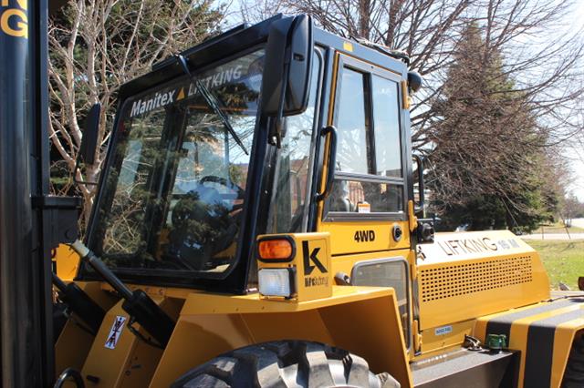 Redesigned cab with larger glass area.