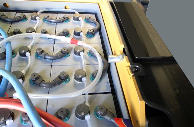 Electric battery restraint