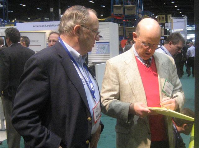Richard Higgins (let) with Forklfitaction.com News North American bureau chief Roger Renstrom.