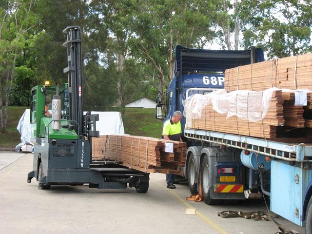 A Combilift multidrectional forklift working at timber company Gunnersen Pty Ltd in Smithfield, Sydney.