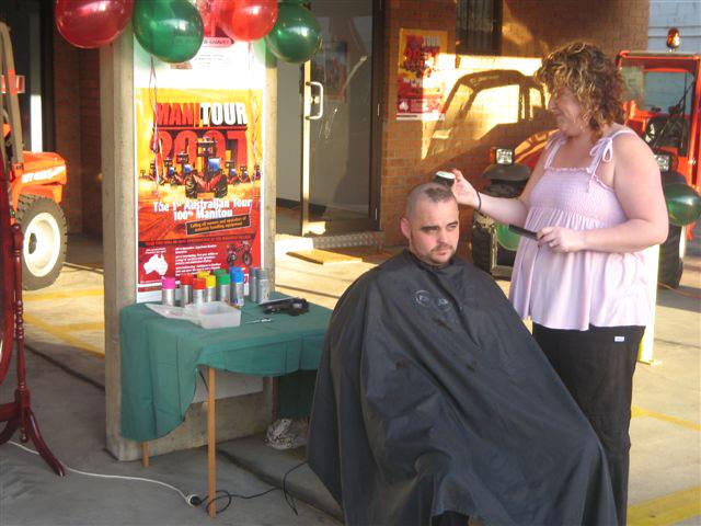 Manitou's Chris Robinson has his head shaved by hairdresser Jodie Huxtable to raise money for the Leukaemia Foundation. Pic supplied by Manitou Australia.
