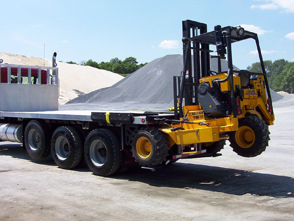 Sellick forklift mounted at the back of a truck.