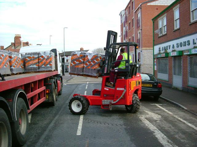 A Moffett truck-mounted forklift.