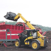The Caterpillar TH210 compact telehandler.