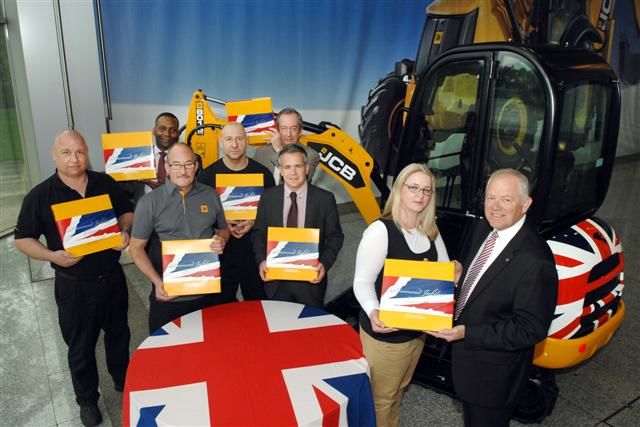 JCB CEO Alan Blake (extreme right) presents Diamond Jubilee gifts to (l-r) Trevor Burgess, Errol Bailey, Les Walker, Dave Brian, Hugh McLaren, Martin Graves and Victoria Hudson.