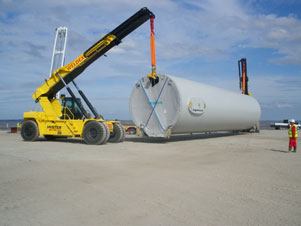 A Hyster RS 46-41L CH reach stacker is handling wind farm components at Port of Mostyn.