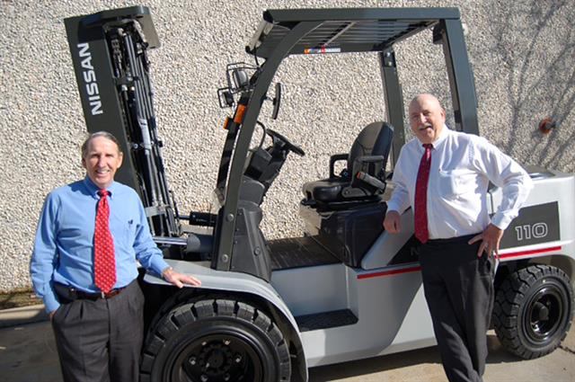 Sunbelt Industrial Trucks' president Bill Rowan, left, and chief executive officer Warren Cornil