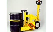Power Pusher unit for lifting and moving barrels.