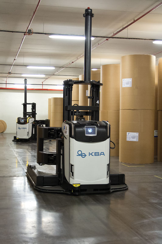 At L'Imprimerie reel logistics is handled by six Rocla AGVs. Click for larger image
