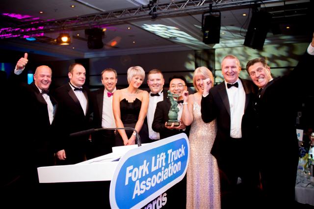 Doosan Industrial Vehicle UK accepting the award for innovation. Click for larger view