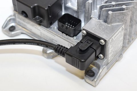 Charger with sealed AC cord for use inside a Class 3 forklift battery tray