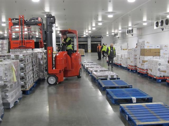 Full pallet loads of the most popular product in the distribution centre are arranged in an aisle format at ground level when using the FlexiPiCK.