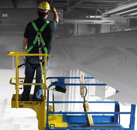 Man Lift's SHU-brand vertical extension deck attachment for scissor lift<br />platforms