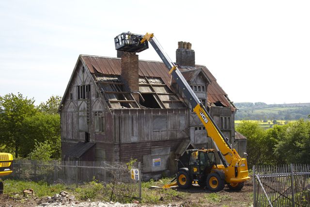 A JCB 540-170 Loadall telehandler and a 22T JCB JS220 tracked excavator completed the demolition of this house.