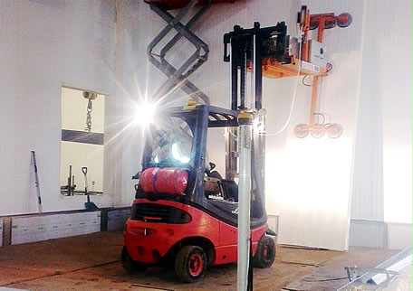 The counterbalanced forklift had to be lifted by crane for use on the top floor of the six-storey building.