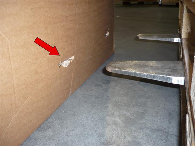 Image 2 Damage caused because the lift truck forks protrude at the rear of the other load.