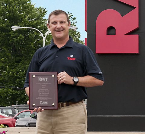 Mike Ballas with Raymond's award
