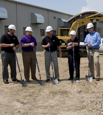 Ron Earl, marketing director; Todd Hart, executive vice president; Robert Burnetter, chief executive officer; Daniel Campau, president; and Mark Herrema, engineering director.