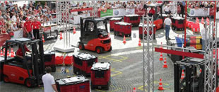 The competition tested the forklift operators' practical driving skills.