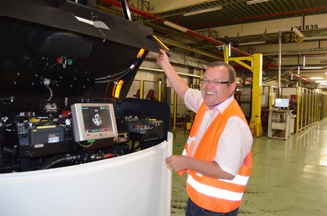 The director of the Finishing Department Manfred Rohling is satisfied with the transporting capacity and effectiveness of the Rocla AGVs. Click for larger view.
