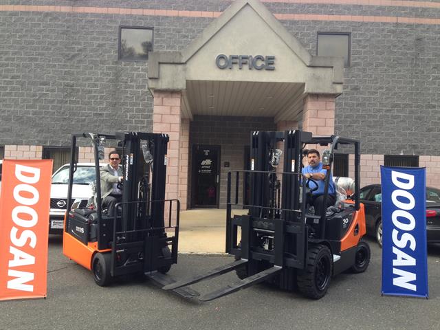 Liftec's Doosan dealer principals, from left, Tom Sylvester, executive vice president, and Steve Panek, president