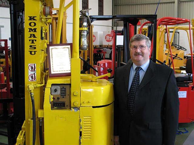 James Brindley with the only Asian exhibit at his museum - a 36-year-old Komatsu FB10R-1 reach truck.
