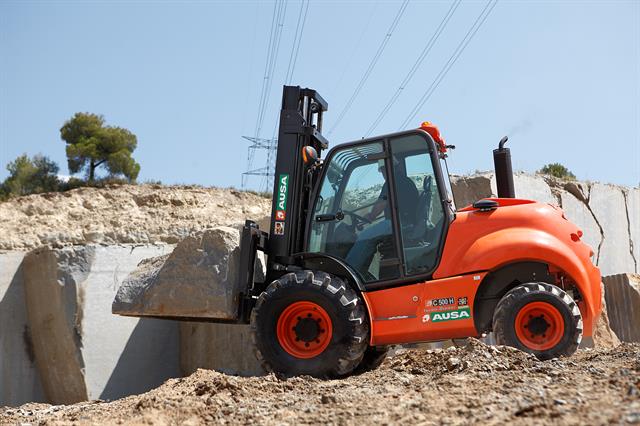 AUSA rough-terrain forklift at work