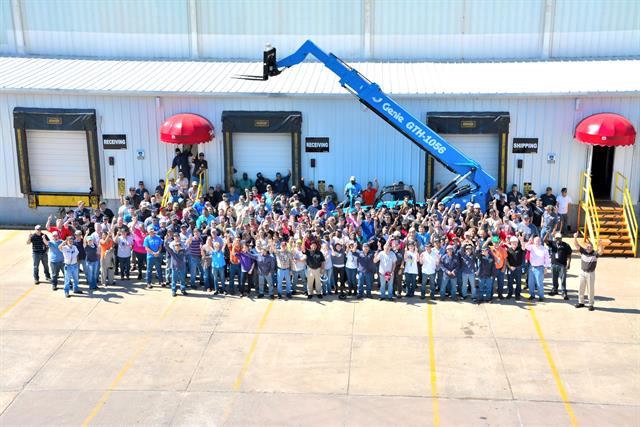 The team in Oklahoma City celebrates completion of its first Genie GTH-1056 telehandler.