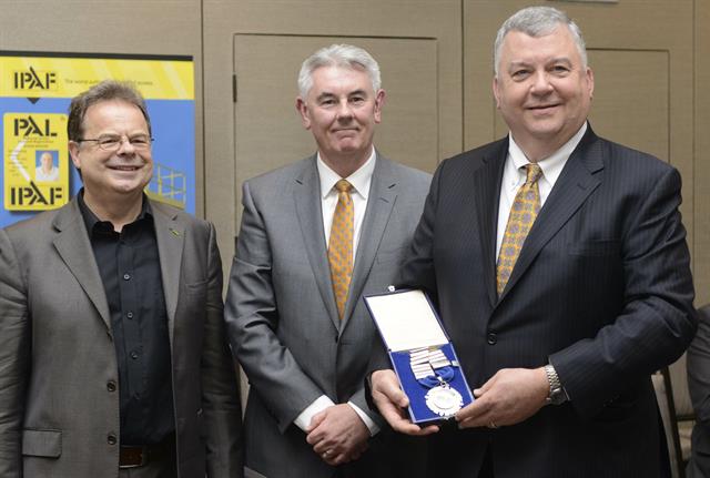 (L-R) IPAF chief executive officer Tim Whiteman with new president Steve Couling and outgoing president Andy Studdert.