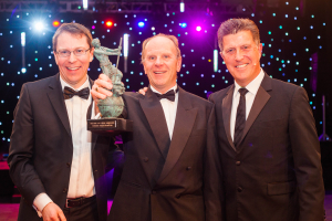 (L-R) Martin McVicar of Combilift, Customer Focus Award winner Ian Mounce of Bristol Forklifts and broadcaster Jonny Gould.