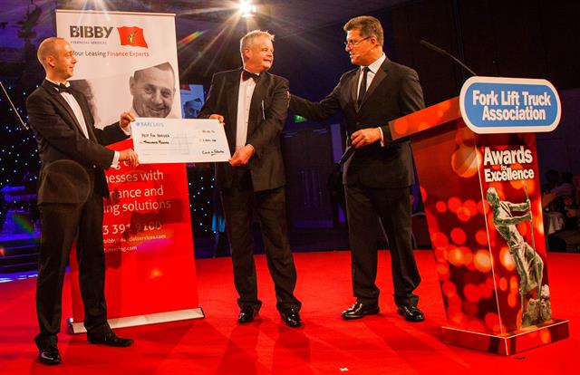 Paul Stamp and John Bradshaw hand over a cheque