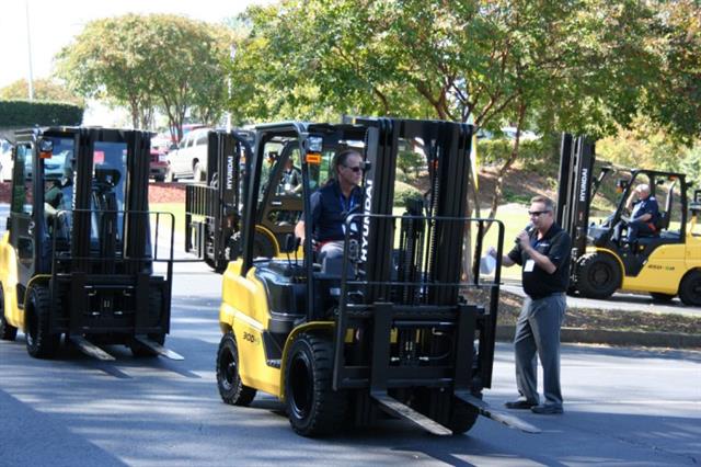 Tim Webb, national sales manager for Hyundai Forklift demonstrates the Hyundai 30D-9 diesel forklift