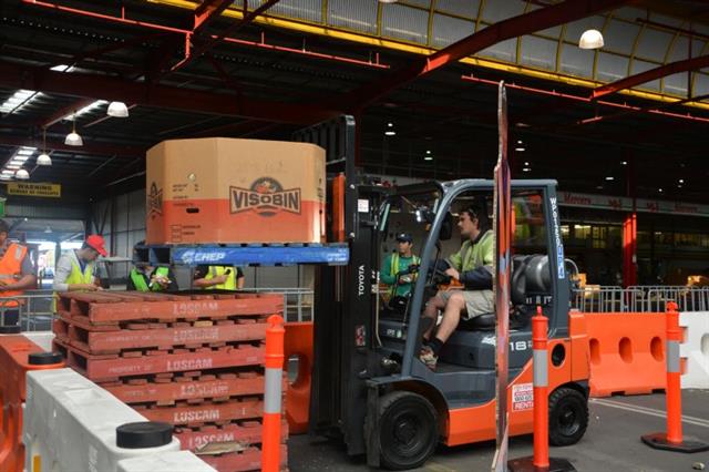 A contestant negotiates the course at the 2015 Toyota Forklift Challenge at Perth's Market City.