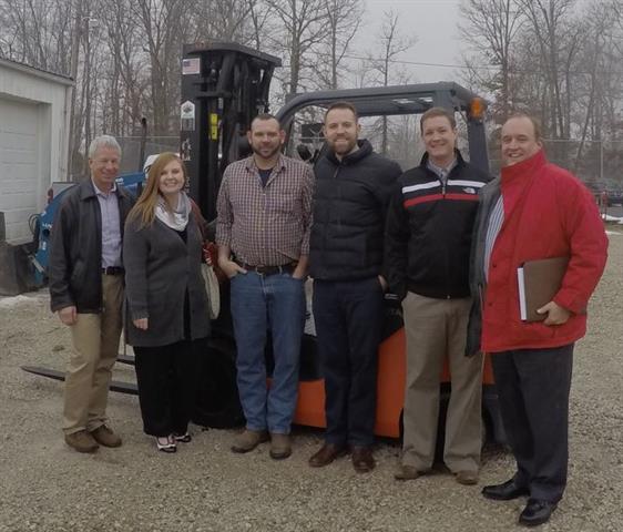 Hope Hill representatives receive their new forklift
