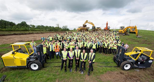 Breaking ground on the new factory site.