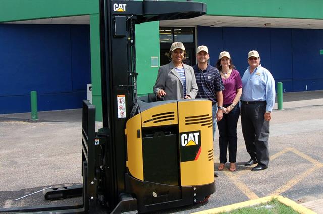 Algenita Scott Davis, Houston Habitat for Humanity executive director; Jay Gusler, MCFA director of operations; Amy Bradberry, MCFA employee relations manager; and Jerry Kovaly, Habitat construction director. Photo by Amanda Midglin, Vollmer