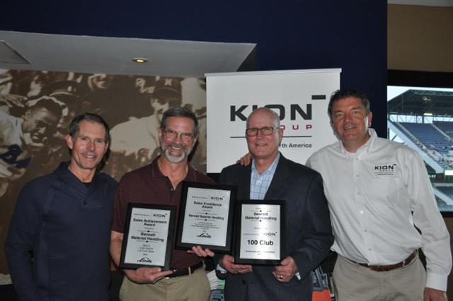 John Bourke and Gregg Bennett of Bennett Material Handling with KION's Rick Schiel and Vincent Halma.