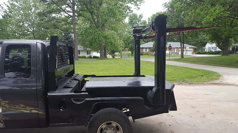 Bristow's invention turns a pickup into a forklift
