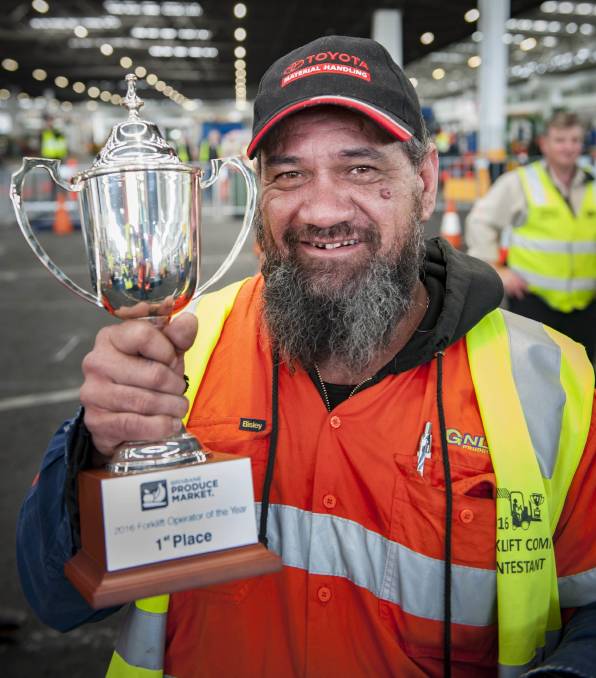 Jason Thompson with his trophy.<br />PHOTO: Queensland Country Life