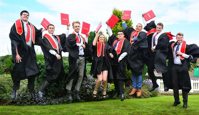 JCB's graduates: Todd Bradshaw, Sam Turner, Jak Fuce, Catherine Bull, Oliver Jones, David Layne, Adam Varley and Robert Clark.