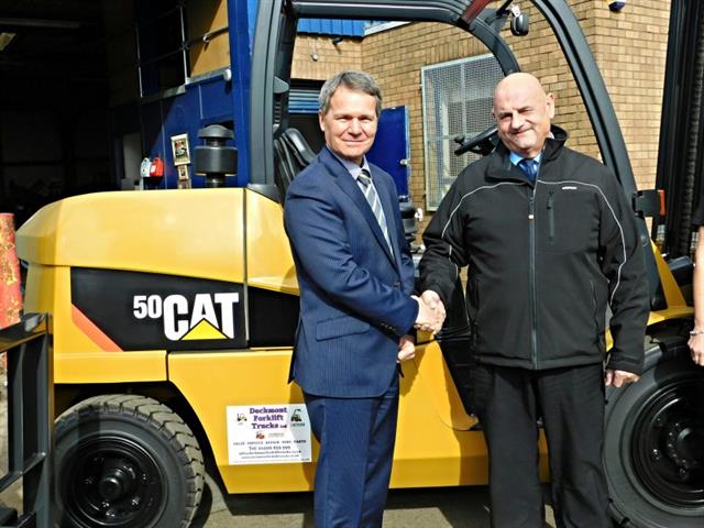Impact's Terry Kendrew with Davey Forrest, managing director of Dechmont