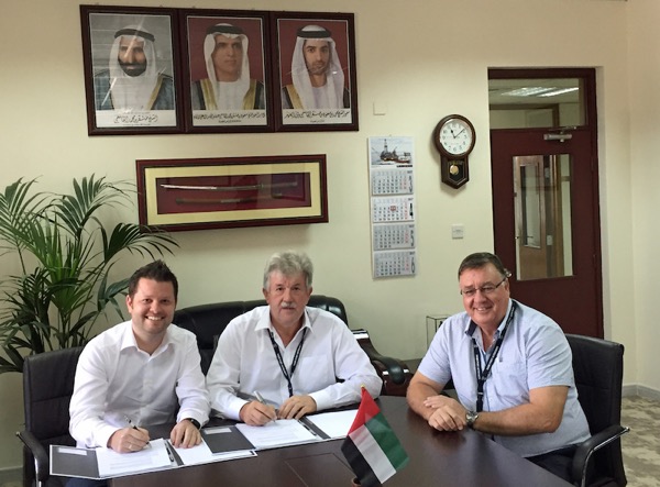 Günter Berthold (Liebherr) with RAK Ports' Cliff Brand and David Owen