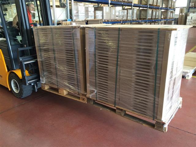 Handling two pallets at a time reduces the lift truck journeys and handling time by 50%.