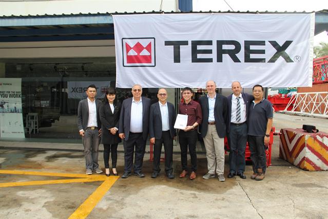 Crane World Asia's team welcomes the new cranes.