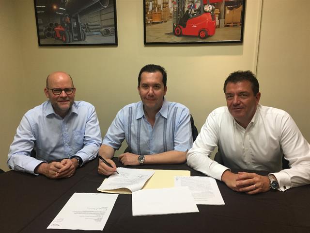 Left to right: Gordon Riske, CEO of KION Group; Adrian Gonzalez, CEO of Bravo Montacargas; and Vincent Halma, president and CEO of KION North America.