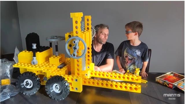 Matt Denton, nephew Reuben and their giant LEGO forklift