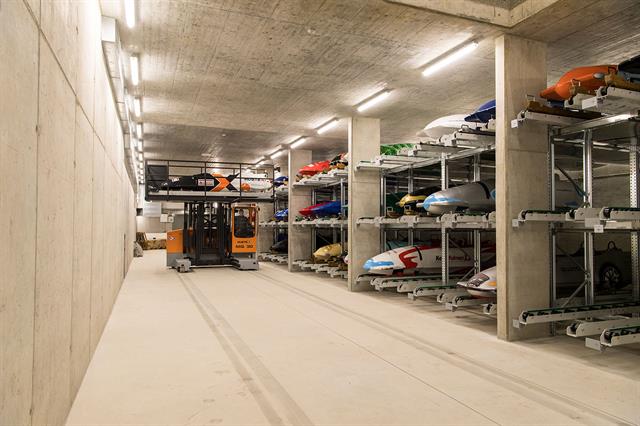 A total of 75 bobsleighs are stored in a new warehouse featuring a customised two-level rack system.